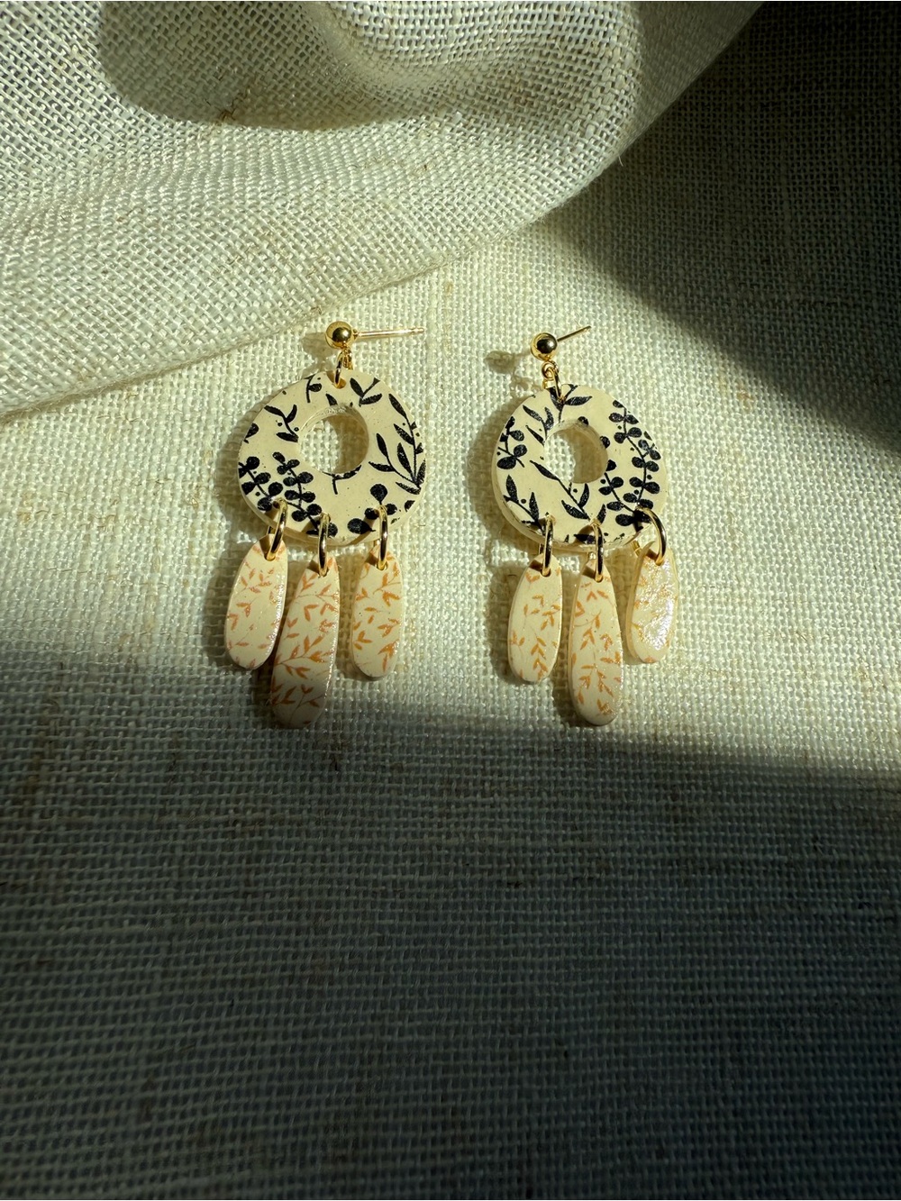 Handcrafted Polymer Clay Cream and Black Floral Dangle Earrings - Gold Accents